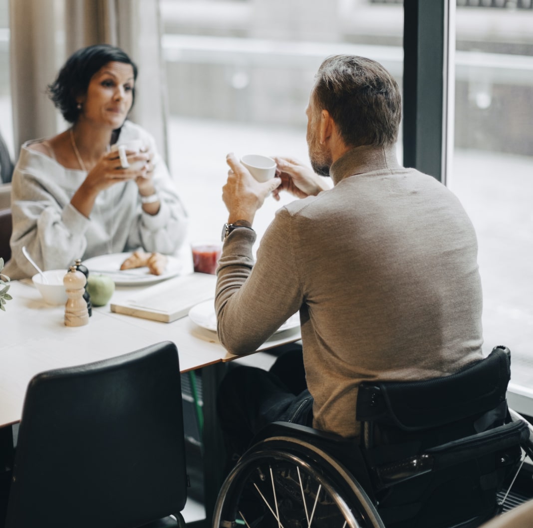 Couple enjoying a coffee during their trip