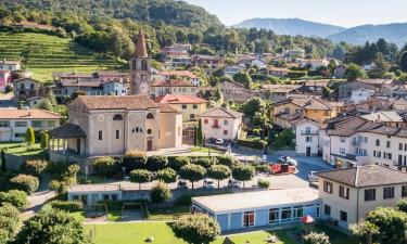 Hoteles con estacionamiento en Comano