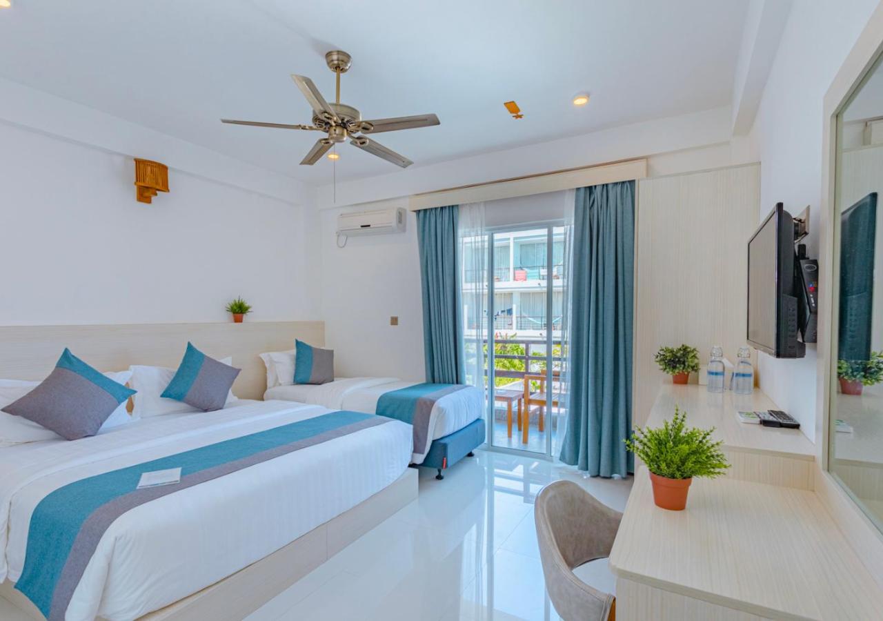 Deluxe Triple Room, photo 1