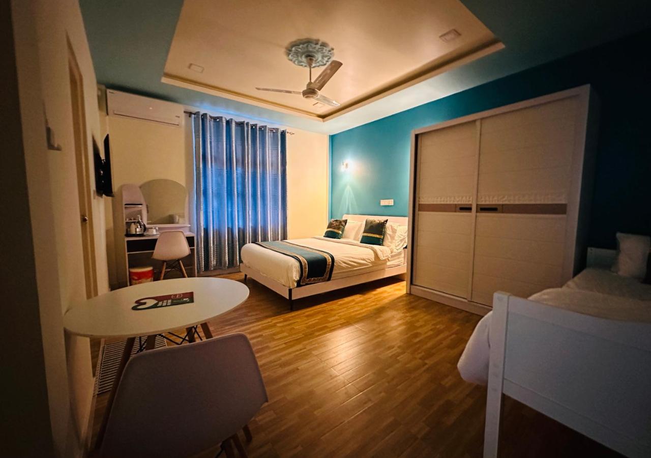 Deluxe Triple Room, photo 1