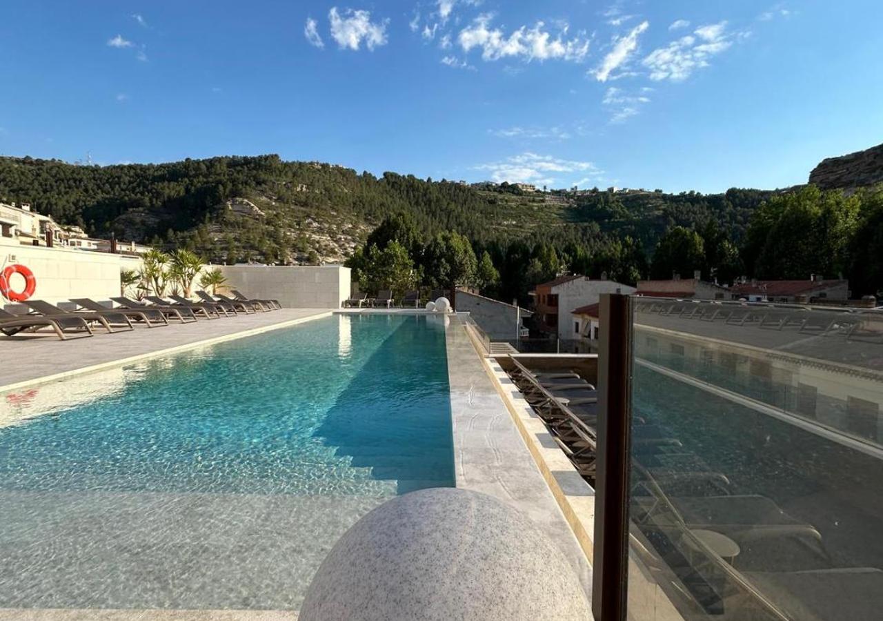 The pool with a view and hot tub are the special features of this suite. This spacious suite features 1 living room, 1 separate bedroom and 1 bathroom with a bath and free toiletries. The well-fitted kitchen has a stovetop, a refrigerator, a microwave and a tea and coffee maker. The air-conditioned suite features a flat-screen TV, a washing machine, soundproof walls, a mini-bar as well as garden views. The unit has 1 bed.