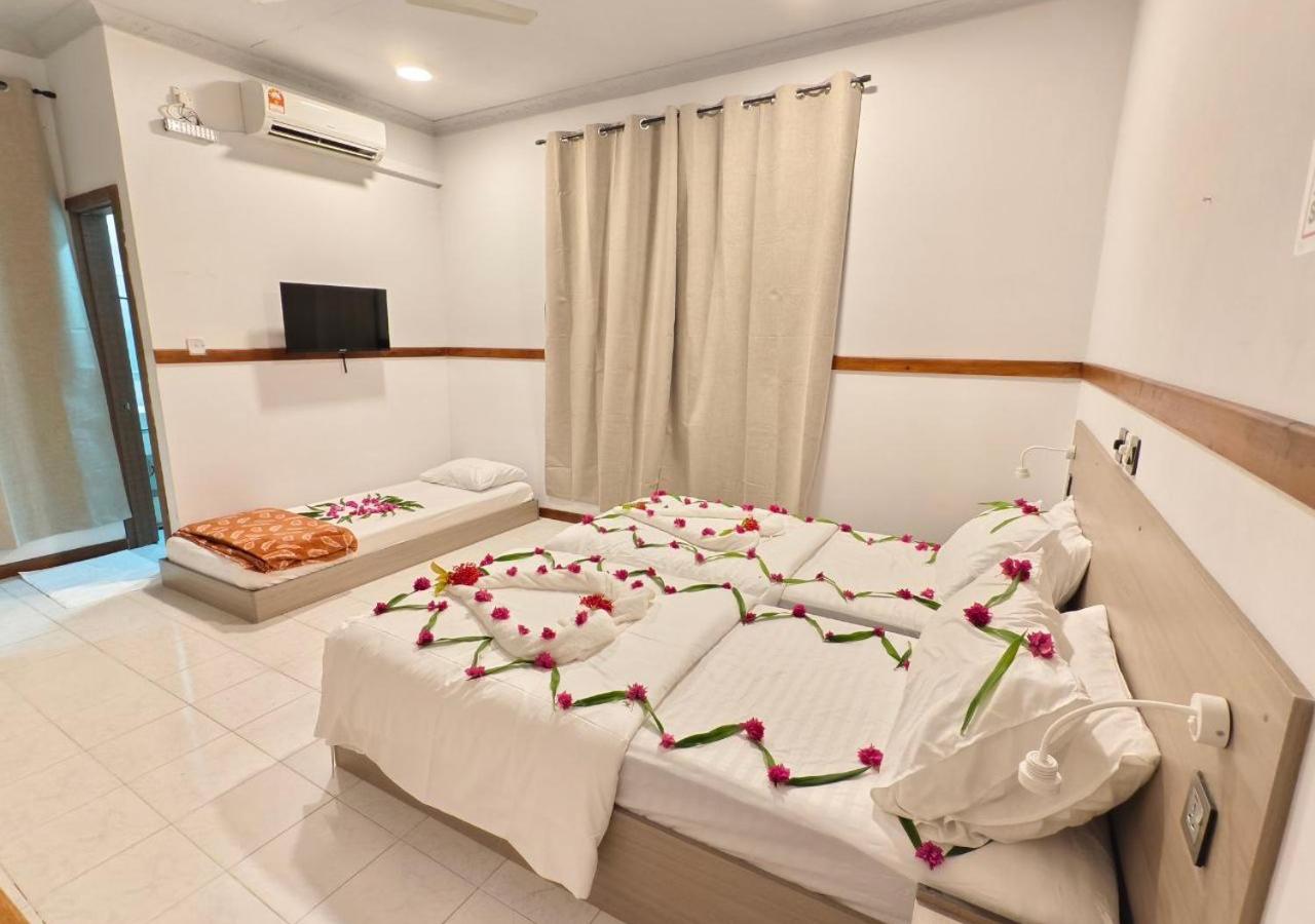 Deluxe Triple Room, photo 1