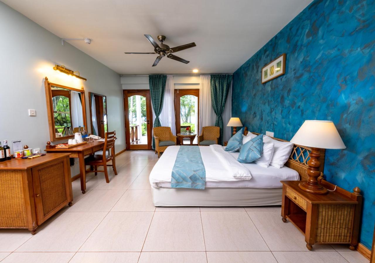 Deluxe Beachfront Room, photo 1
