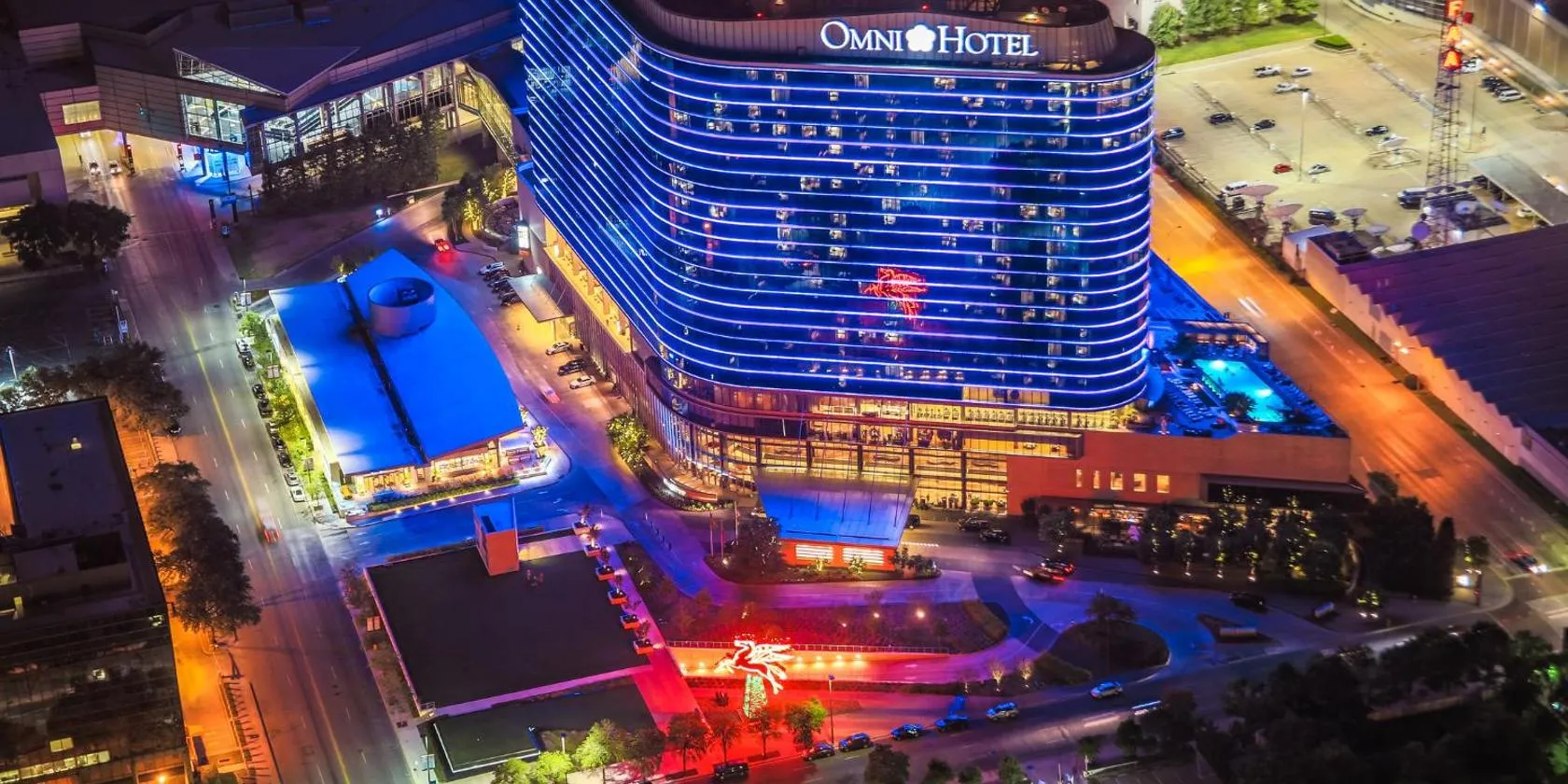 Omni Dallas Hotel at night beside Kay Bailey Hutchison Convention Center Dallas