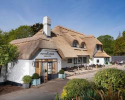 The Potters Heron - A Heartwood Inn
