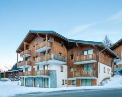 Vacancéole - Résidence Les Chalets de la Ramoure