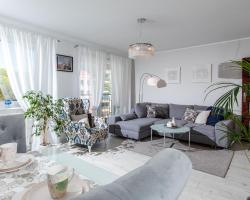 Jasnoszary Apartament Sun Seasons 24 w Kołobrzegu Blisko Morza by Noclegi Renters