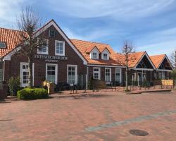 Friesischer Hof, Ferienwohnungen mit Indoor Spielplatz, kostenfreien Parkplatz und W-Lan