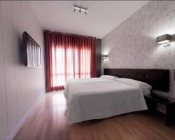 Hospedium Hostal Un Punto Chic