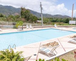 Apartment in Villas Del Faro Resort with WIFI