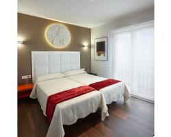 Apartamentos Caballerizas Granada con parking gratuito en pleno centro