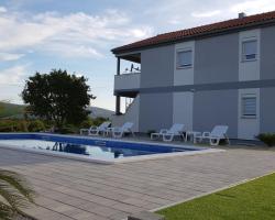 Apartments Zanic with private swimming pool and sea view