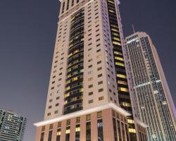 Magnum Hotel & Suites West Bay