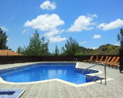 K.H.G. Stone-Wood Cottages