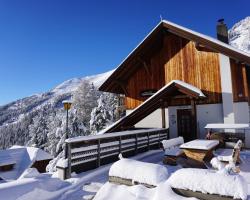 Bergheim Schmidt, Almhütten im Wald Appartments an der Piste Alpine Huts in Forrest Appartments near Slope