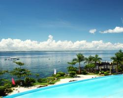 Mactan Island Condo La Mirada Residence , Beach resort , Large 1 bedroom , pools , Ocean views, fast WiFi , Netflix