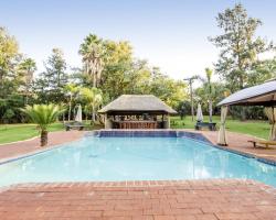 WoodRidge Palms Boutique Hotel