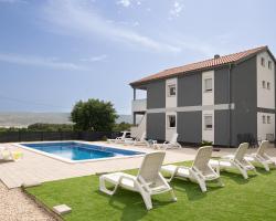 Apartments Zanic with private swimming pool and sea view