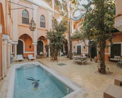 Riad Le Perroquet Bleu Suites & Spa