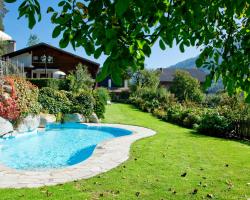 Residence Obermoarhof - comfortable apartments for families, swimmingpool, playing-grounds, Almencard