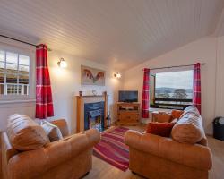 Appin Holiday Homes -Caravans, Lodges, Shepherds Hut and Train Carriage stays