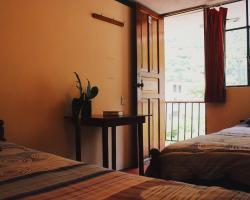 Kiwi Hostel & Suites Baños
