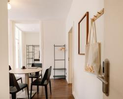 Cosme Apartments by Olala Homes