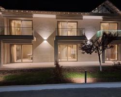 Haus Platanos Apartments & Bungalows by the Sea