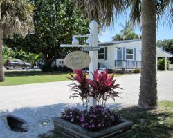 Tropical Winds Beachfront Motel and Cottages