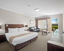 Carlyle Suites & Apartments