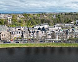 Glen Mhor Hotel at Uile-bheist 'Brewstillery'