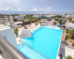 Phenomenal Location Near Beach & 5th with Stunning Roof Pool