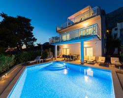 Villa ELLA ESTELLE with a heated pool, hot tub, sauna