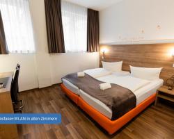 Orange Hotel und Apartments