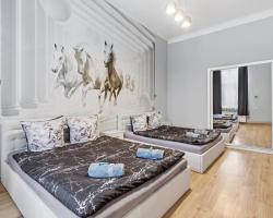 Queen Apartments
