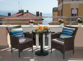 Iva, Opatija centar