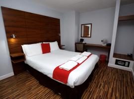 Cocoon @ International Inn + Apartments