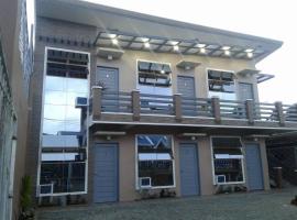 Brown Epitome Lodge, hotel dengan parking di Baler