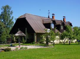 Hunting House Ezerkrasti, holiday home in Lapmežciems