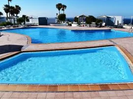 Puerto del Carmen center - New Apartment by the pool and private parking