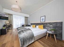 HEITZMANN - Hotel & Rooftop – hotel w mieście Zell am See