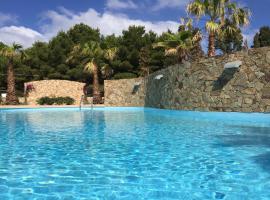 RESIDENCE ELEGANCE ville ed appartamenti a Porto Pino, hotel v destinaci Porto Pino