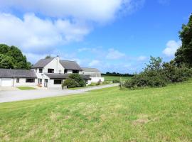 Tyddyn Crwn Country-House Apartments, Castell Aberlleiniog, Beaumaris, hótel í nágrenninu