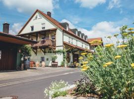 Weingut Leininger Ferienwohnungen, hotel en Eibelstadt