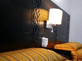 Aparthotel Siete 32, hotell i Mérida