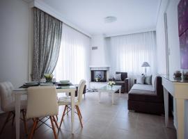 Villa Kiza Apartments, hotel u gradu 'Agia Triada'