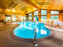 Rustlers Lodge, hotel con jacuzzi en Sundre