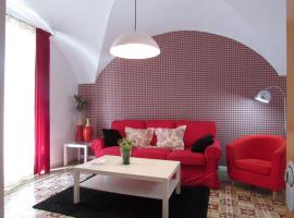 Apartamentos La Machacona Plaza de Santiago, hotel di Cáceres