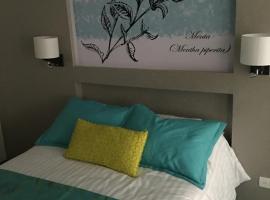 Herbal Inn Suites, lejlighedshotel i Puebla