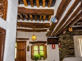 Casa el Portón, rumah percutian di Bubión